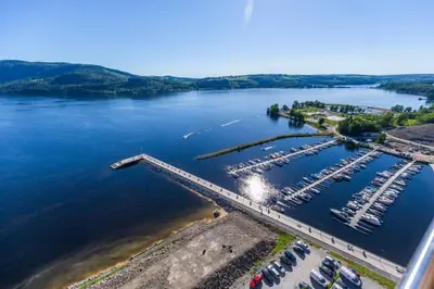 an aerial view of a marina with boats in the water at Mjøssuite with lovely view in Ringsaker