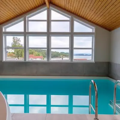Exclusive fjordside villa with swimming pool