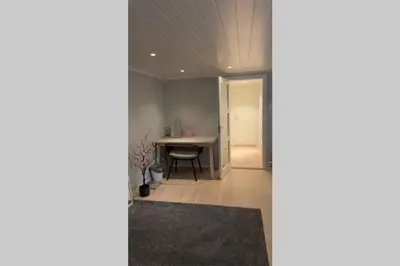 a view of a living room with a table at Townhouse with fantastic outdoor area in Trondheim