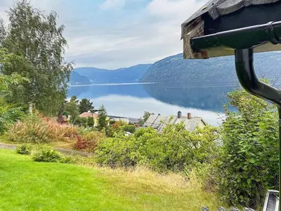 a view of a lake from a house at 6 person holiday home in Utvik in Utvik