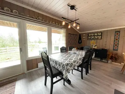 a dining room with a table and chairs at Sigurdhytta in Ål