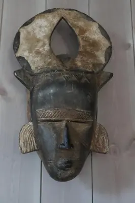 a mask hanging on a wall at Cozy Apartment by the slopes in Kvitfjell Vest in Favang