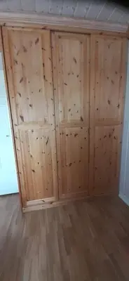 a room with wooden walls and wooden floors at Beitostølen Hytter in Beitostøl
