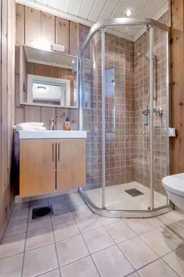 a bathroom with a shower and a sink at Gaustablikk hytta ski-in ski-out in Gaustablikk
