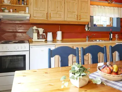 a kitchen with a table with a bowl of fruit on it at 5 person holiday home in Hemsedal-By Traum in Hemsedal