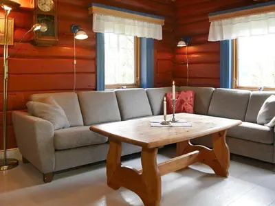 a living room with a couch and a coffee table at 5 person holiday home in Hemsedal-By Traum in Hemsedal