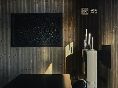 a dining room with a table and a picture on the wall at Cozy Apartment electric car charger & ski in out Sjusjøen in Sjusjøen