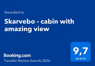 a blue screen with the words skavenbo coalition withanking view at Skarvebo - cabin with amazing view in Hol