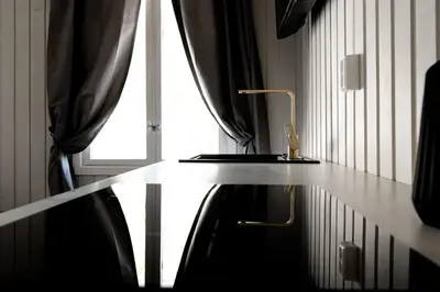 a counter top in a room with a window at VILLA BRATTHOLMEN in Brattholmen