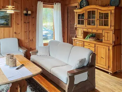 a living room with a couch and a table at 7 person holiday home in STRYN-By Traum in Stryn