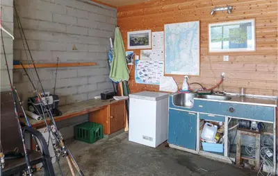 a kitchen with a counter and a sink in a room at Cozy Apartment In Rosendal in Rosendal
