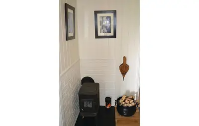 a hallway of a home with white walls at Cozy Apartment In Norheimsund With Wifi in Norheimsund