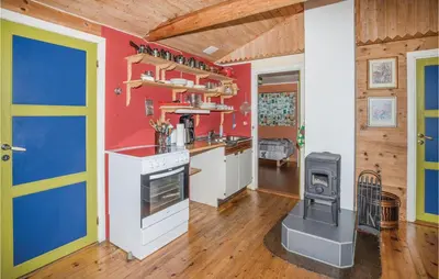 a kitchen with a stove and a oven in a room at Holiday Home Balestrand Stokkebø Ii in Balestrand
