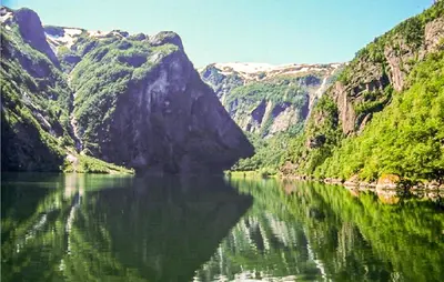 a large body of water in a canyon with mountains at Nice Home In Vik I Sogn With Jacuzzi in Åse