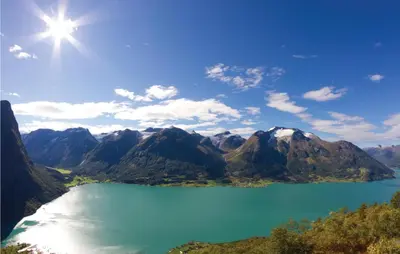 a view of a lake with mountains in the background at Glomnes Nr 2 in Hjelle
