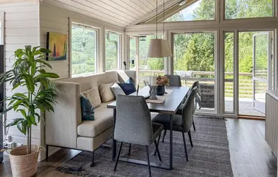 a living room with a couch and a table at Stunning Home In Stranda With Sauna in Stranda
