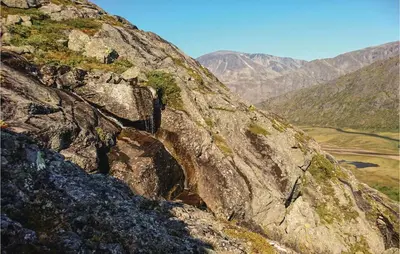 a rocky mountain with a view of a valley at Thorleifsbuskogheim in Vang I Valdres