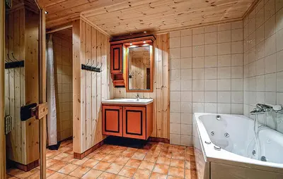 a bathroom with a tub and a sink at Nice Home In Hemsedal With Sauna in Hemsedal