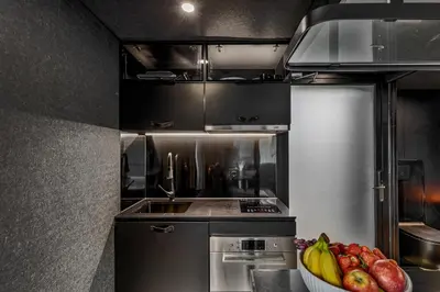a kitchen with a bowl of fruit on a counter at Sogndal Fjordpanorama - The view in Sogndal