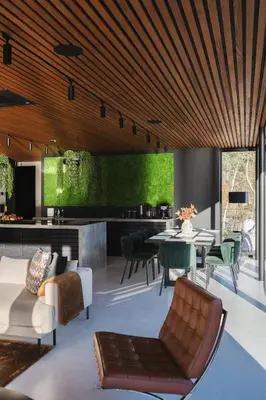 a living room with a table and chairs at VILLA KRISTINA / ÅNDALSNES in Torvik