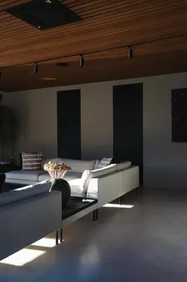 a living room with two couches and a table at VILLA KRISTINA / ÅNDALSNES in Torvik