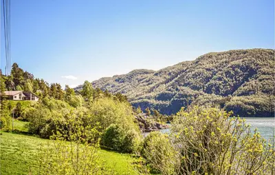 a view of a lake with mountains in the background at Amazing Home In Etne With Wifi in Erve