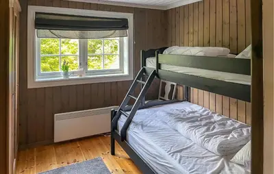 a bedroom with two bunk beds and a window at Pet Friendly Home In Rena With Wifi in Rena
