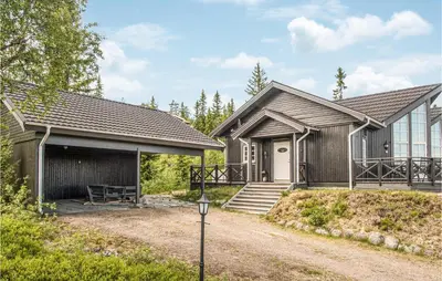 a home in the woods with a garage at Lovely Home In Trysil With Wifi in Trysil
