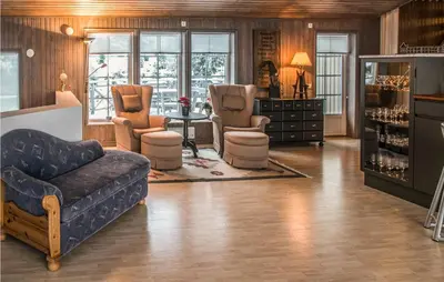 a living room with a couch and chairs at Lovely Home In Trysil With Wifi in Trysil