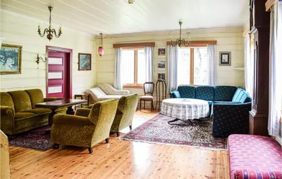 a living room with couches and chairs and a table at 10 Bedroom Lovely Home In Østre Gausdal in Vestre Gausdal