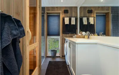 a bathroom with a white counter and a sink at Gorgeous Home In Sjusjøen With Kitchen in Sjusjøen