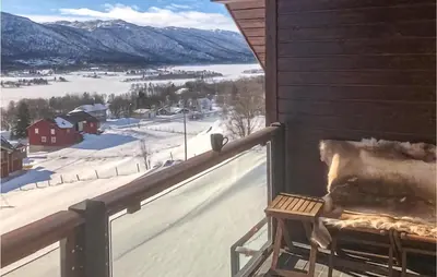 a balcony with a view of a snow covered field at 2 Bedroom Cozy Apartment In Geilo in Geilo