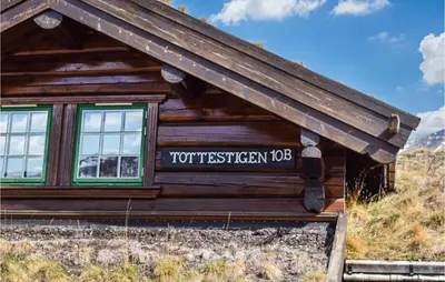 a sign on the side of a log building at Lovely Home In Hemsedal With Wifi in Hemsedal