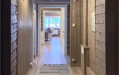 a hallway of a home with a room with a hallway at 4 Bedroom Lovely Home In Ål in Ål