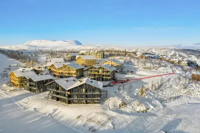 an aerial view of a resort in the snow at Kikut Alpine Lodge 9103 in Geilo