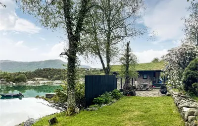 a house with a view of a lake at 3 Bedroom Amazing Home In Skjold in Skjold
