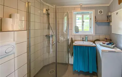 a bathroom with a shower and a sink at Gorgeous Home In Lillehammer With Wifi in Lillehammer