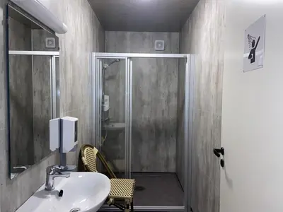 a bathroom with a sink and a shower at Winjum Hostel Stegastein in Aurland