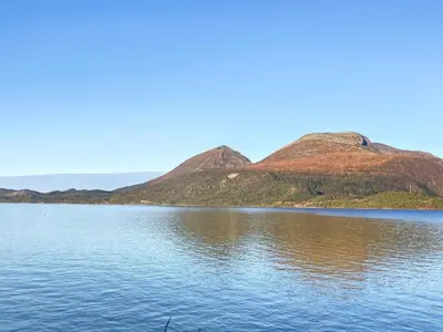 a large body of water with mountains in the background at 8 person holiday home in Halsanaustan-By Traum in Korsnes