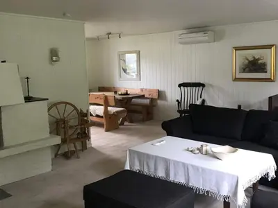 a living room with a couch and a table at 6 person holiday home in Halsanaustan-By Traum in Korsnes