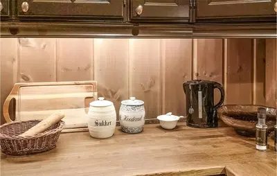 a kitchen counter with various items on top of it at Lovely Home In Tuddal With Jacuzzi in Tuddal