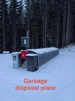 a garbage disposal place in the snow with trees at ! Perfect Snow Condition! Beautiful Apartment at Skagahøgdi with Panoramic View in Gol