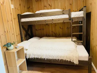 a couple of bunk beds in a room at ! Perfect Snow Condition! Beautiful Apartment at Skagahøgdi with Panoramic View in Gol