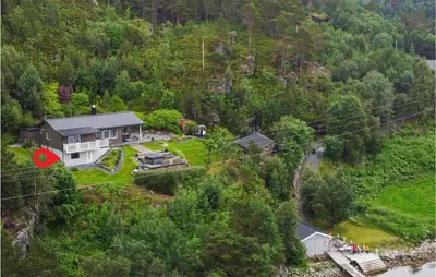 an aerial view of a house in the middle of a mountain at 1 Bedroom Amazing Apartment In Øydegard in Aspa
