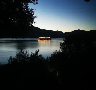 a boat in the middle of a large body of water at Stranda apartment in Stranda