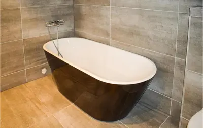 a bath tub in the corner of a bathroom at Stunning Home In Rauland With Sauna in Rauland