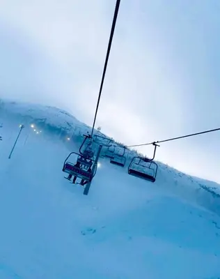 a ski lift going up a snow covered mountain at Fyri Tunet Hemsedal in Hemsedal