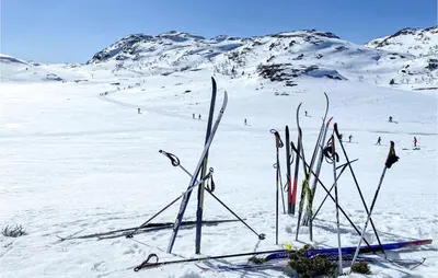 a bunch of skis in the snow on a mountain at Awesome Home In Rauland With Wifi in Rauland