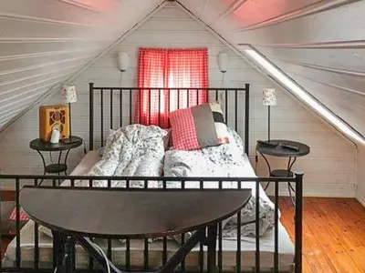 a bedroom with a bed in a attic at 8 person holiday home in Bruvik-By Traum in Bruvik