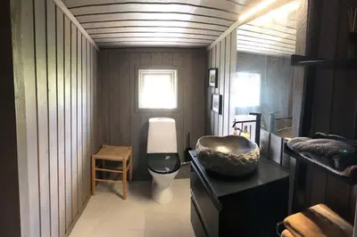 a bathroom with a sink and a toilet at Seterhytte i Havsdalen in Geilo